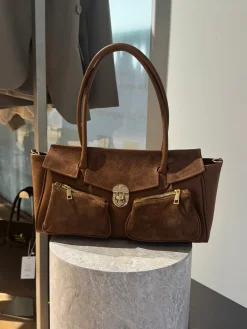 Astrid Frank Tasker|Natalia taske