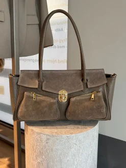 Astrid Frank Tasker|Natalia taske